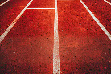 Wall Mural - Empty red running track at the stadium. Concept of running, sport, competition. Generated by artificial intelligence
