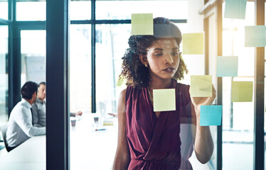 Poster - Business, woman and writing on sticky notes in office for brainstorming, work schedule and meeting reminder. Professional, employee and ideas on glass in conference room with presentation information