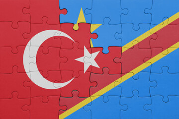 puzzle with the colourful national flag of democratic republic of the congo and flag of turkey.