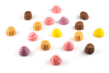 Poster - Set of delicious jelly candies in shape of meringue and cupcake on white background