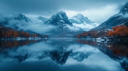 Wall Mural - A photographic display of autumn colors amidst snowy mountains with a perfect reflection on a still lake