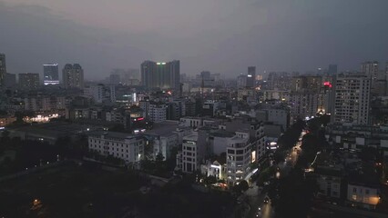 Poster - Aerial view of Hanoi Downtown Skyline, Vietnam. Financial district and business centers in smart urban city in Asia. Skyscraper and high-rise buildings at night.