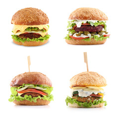 Wall Mural - Different delicious vegetarian burgers isolated on white, set