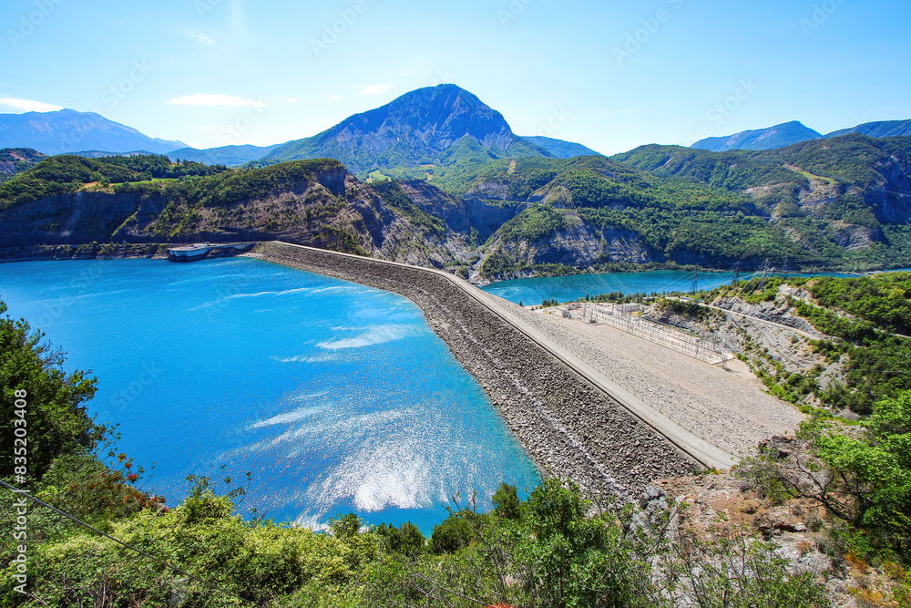 Aerial view of the Dam of Serre-Ponçon, an embankment dam made of ...