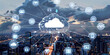 © jex - A cloud symbol with digital connections floats above an urban landscape, surrounded by icons representing networks and mobile devices. Illustrating the concept of cloud computing and connectivity.
