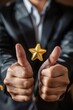 © Fotograf - A man in a business suit gives a thumbs up gesture, suitable for use in corporate or professional settings