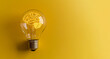 © Mirador - Light bulb with brain-shaped filament glowing against a yellow background, symbolizing creativity and innovation.