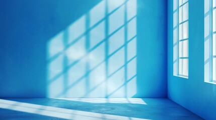 Wall Mural - Minimalistic empty blue room with sunlight casting window grid shadows on the walls and floor, creating a serene and abstract ambiance.