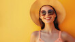 © Partha - woman wearing a straw hat and sunglasses, posing against a pastel orance background banner with copy space