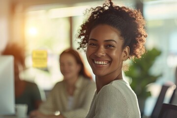 Wall Mural - A young curly-haired woman engaged in a business meeting in a modern office environment, representing diversity