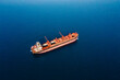 © Leonid - Dry bulk cargo carrier ship anchored washing ship holds preparing for loading new dry cargo, aerial view