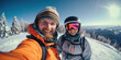 © vefimov - A man and a woman posing for a selfie while on a snowy ski slope, both smiling and having fun