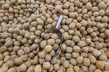 Wall Mural - Walnuts sold at the market stall.