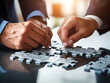 © Akilmazumder - Business puzzle, Colorful 3D Business Puzzle, Business people joining puzzle together, teamwork and unity in business concept