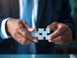 © Akilmazumder - Business puzzle, Colorful 3D Business Puzzle, Business people joining puzzle together, teamwork and unity in business concept