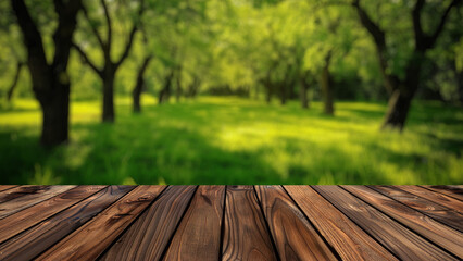 Empty wood table top with blur background of nature lush green forest. The table giving copy space for placing advertising product on the table along with beautiful green forest nature background.