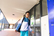 © wavebreak3 - Biracial boy standing in a school corridor, with copy space