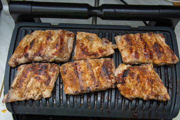 Sticker - Grilling  steaks on barbecue grill 