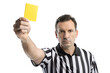 © Big - the referee in black holds up a yellow card isolated on background