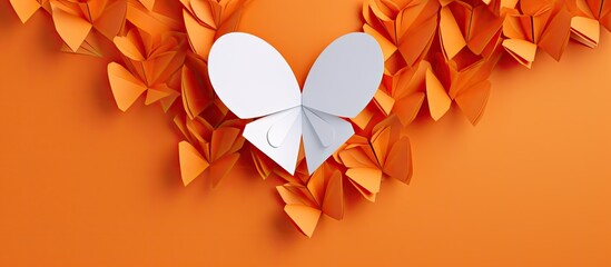 Wall Mural - Origami heart crafted from paper against a black backdrop with copy space image.