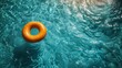 © Ivana - gold swimming ring floating in the swimming pool