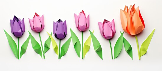 Wall Mural - Tulip origami displayed on a white background with copy space image.