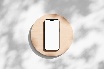 Wall Mural - studio scene with iphone mobile phone with blank screen on the wooden podium