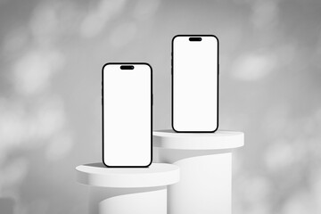 Wall Mural - two iphone mobile phones with blank screen on the podium