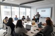 © YURIMA - Office meetings foster team collaboration and presentations in a conference room, enabling business professionals to engage in discussions using laptops in a corporate environment