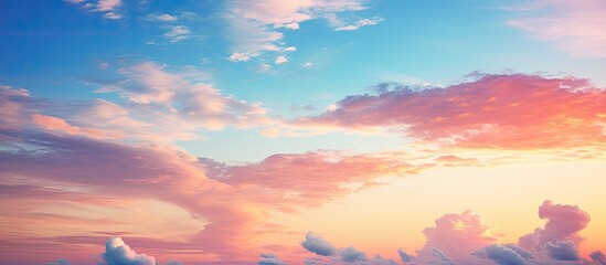 Wall Mural - soft pink clouds create a gentle and romantic atmosphere in the sky during dawn and sunset, ideal fo