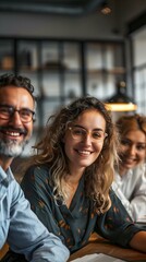 Portrait of a group of business people smiling and looking at the camera