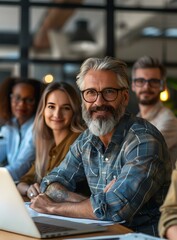 Wall Mural - portrait of a smiling businessman with his colleagues in the background