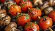 © Ruslan - Fried tomatoes and mushrooms on skewers on grill