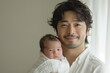 © dark_blade - japanese father holding his newborn son. ai generated