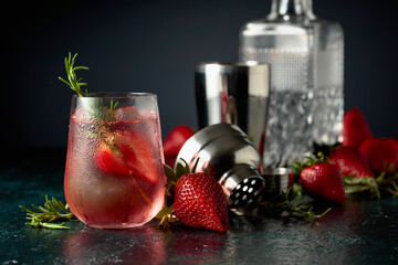 Sticker - Cocktail with ice, strawberries, and rosemary.