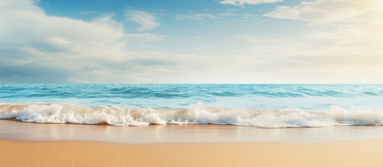 Wall Mural - Sandy beach with blur sea on background. Creative banner. Copyspace image