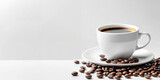 Coffee cup and beans on a white background.