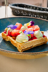 Wall Mural - belgian waffle with fresh berries