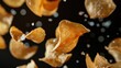 © Matcha_09 - Floating potato chips with salt crystals visible, showcasing their delicious flavor.
