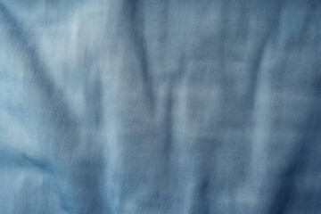 Wall Mural - Processed collage of folded denims jean blue fabric texture. Background for banner, backdrop