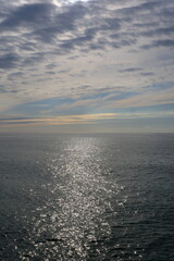 Wall Mural - clouds over the sea, sunset over sea