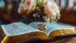 © pawimon - Wedding Rings on Bible Focus on a pair of wedding rings resting on an open Bible, with a church background, empty space right for text marry valentine