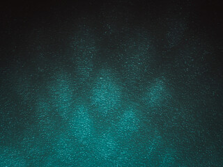 Wall Mural - Light reflects blue shadows on a foam board in the dark for a minimalist abstract background. 