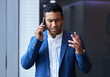 © N Lawrenson/peopleimages.com - Phone call, frustrated and businessman by window for communication, anxiety and stress in office. Male executive, smartphone and upset in conversation for disappointed, difficult client and company