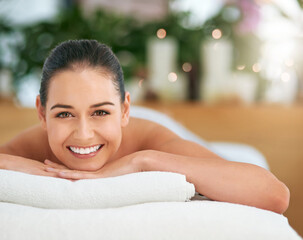 Massage, portrait and smile with woman in spa with masseuse to relax for health, peace or wellness. Beauty, calm and stress relief with happy client in beauty clinic or salon for natural treatment