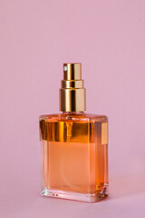 Wall Mural - Perfume on pink background