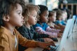 © InfiniteStudio - Multiethnic group of children using computers in a classroom.