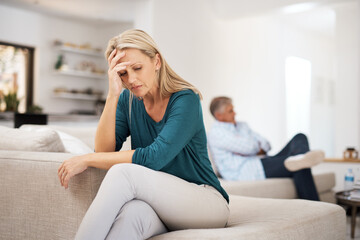 Couch, couple and fight in home for annoyed, divorce or married people for argument. Disagreement, sofa and lounge for frustrated woman, affair or emotion in toxic relationship with mature partner