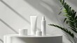 © CHAWA GEN - High-quality image of white cosmetic tubes displayed on a stylish podium with related beauty items, well-lit with ample space for text