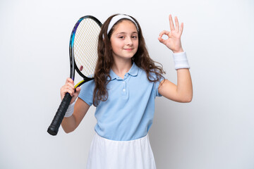 Canvas Print - Little girl isolated on white background playing tennis and making OK sign